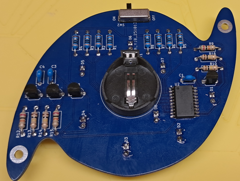 Battery and switch in place on PCB