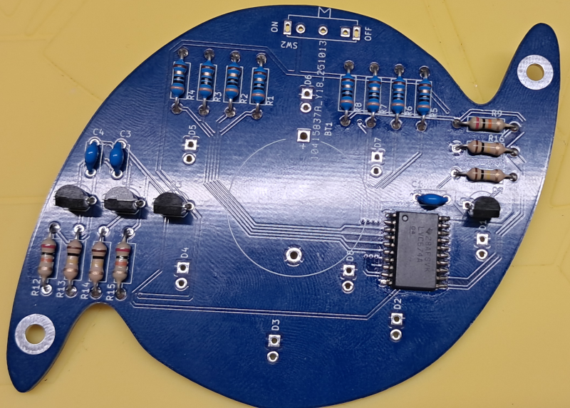 Transistors and capacitors in place on PCB
